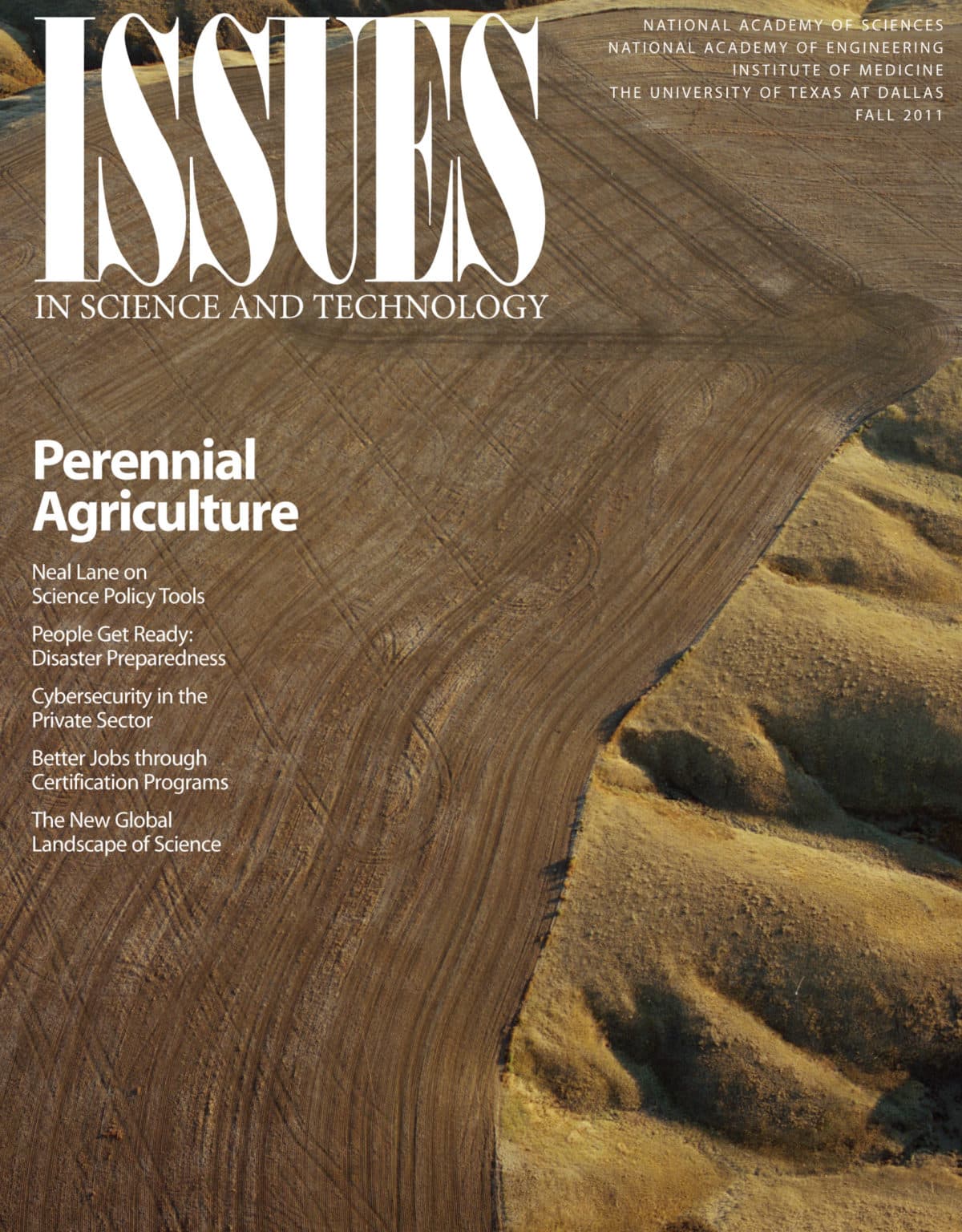 Magazine cover shows a dirt road crossing agricultural landscape