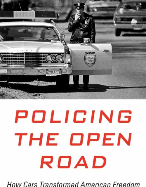 Policing the Open Road Cover: Police officer on his radio standing outside his car