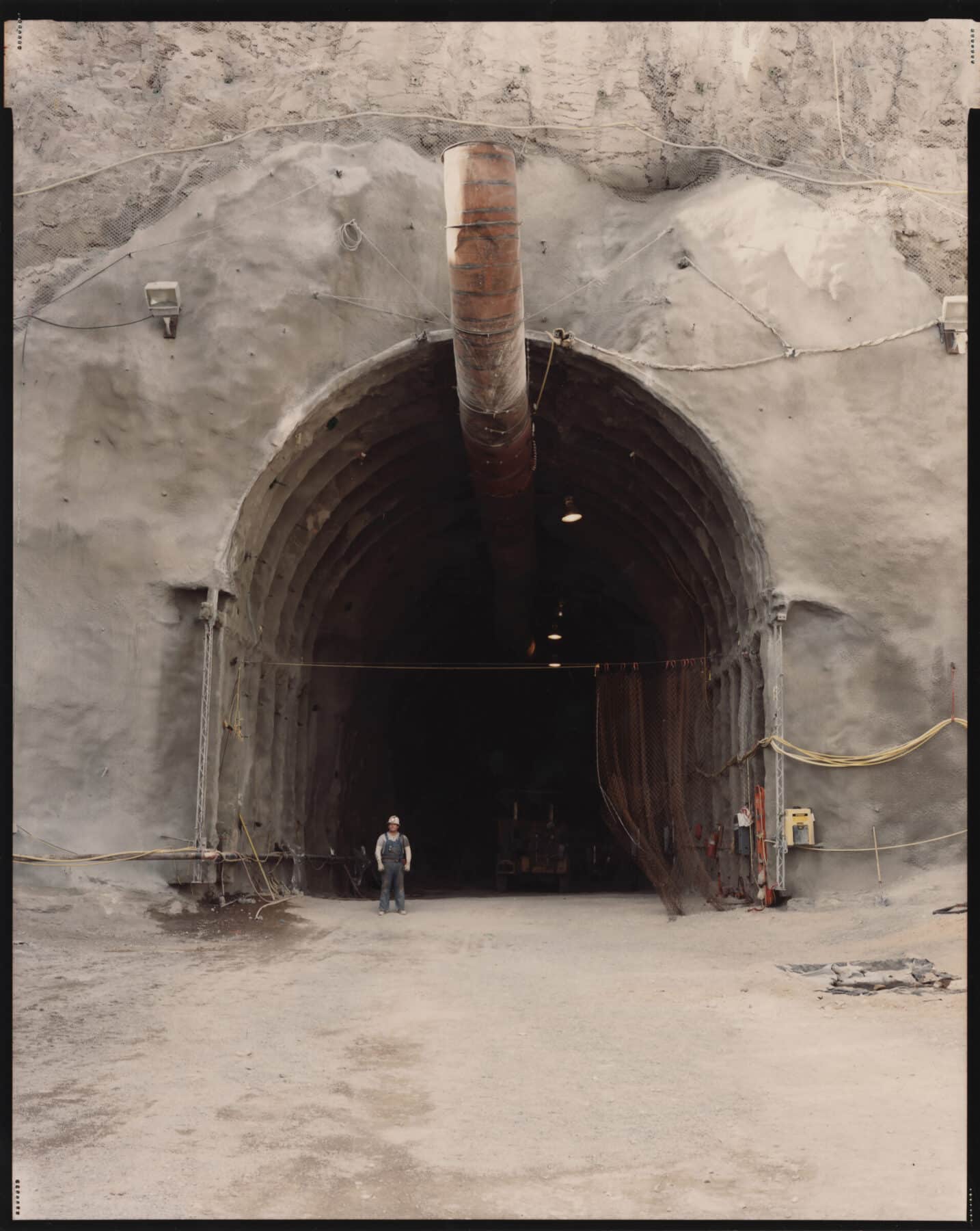 Richard Misrach, Entrance, Yucca Mountain Nuclear Waste Repository (under construction), Nevada, 1994, pigment print. Courtesy of the artist and Fraenkel Gallery, San Francisco, © Richard Misrach.